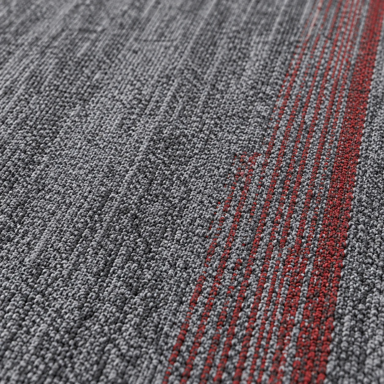 AI-generated close-up illustration of gray carpet texture with a red linear accent